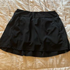 Black tennis/golf skort with pockets
